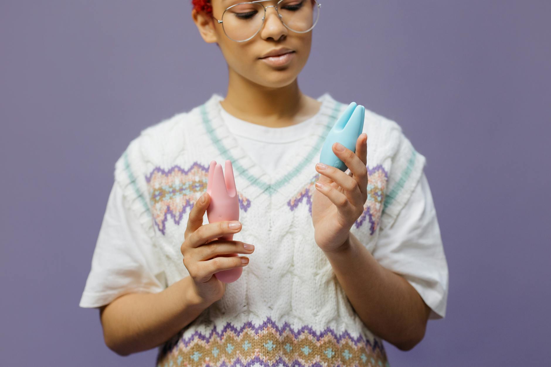 Woman holding lemon vibrators and exploring personal pleasure with intention and openness